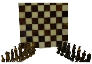 Mable Inlaid Chess Board with Resin Playing Pieces.  One with broken head.