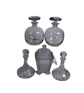 Four (4) Heavy Crystal Decanters and Lidded Jar. 