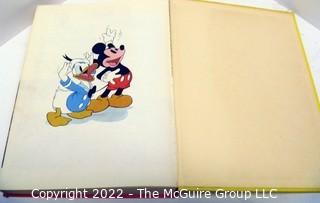 Selection of two Walt Disney hard cover books: compendium 