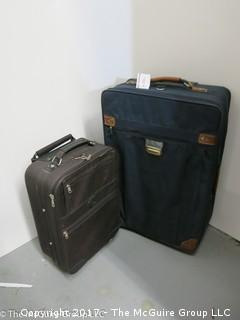 2 pieces of luggage (biggest is 30 1/2" W)