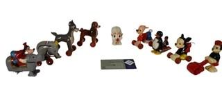 Group of Vintage Celluloid Walt Disney Productions "Fun On Wheels" Character Toys.  Each measure approximately 3" x 2 1/2"