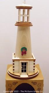 Selection of two Ginger Cottages holiday items  Lighthouse and lighted base