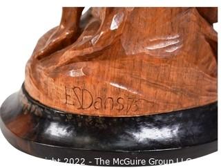 Carved Wood Sculture of Boy with a Slingshot, Signed by Artist E.S. Dans, 1975.  12" tall.