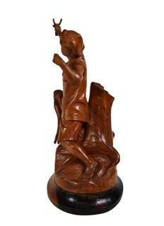 Carved Wood Sculture of Boy with a Slingshot, Signed by Artist E.S. Dans, 1975.  12" tall.