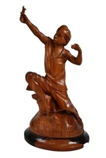 Carved Wood Sculture of Boy with a Slingshot, Signed by Artist E.S. Dans, 1975.  12" tall.