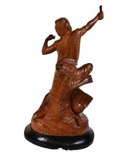 Carved Wood Sculture of Boy with a Slingshot, Signed by Artist E.S. Dans, 1975.  12" tall.