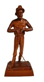 Vintage Wood Carving of Man with Scythe Signed by Artist Jocelyn Caron. Blade of scythe is separated. 15" tall.