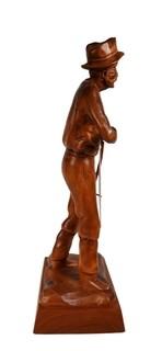 Vintage Wood Carving of Man with Scythe Signed by Artist Jocelyn Caron. Blade of scythe is separated. 15" tall.