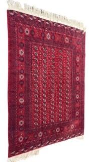 76 x 112" Turkmen Hand Knotted Rug from Afghanistan with Geometric Pattern on Red Ground.  Some moth ball odor.  