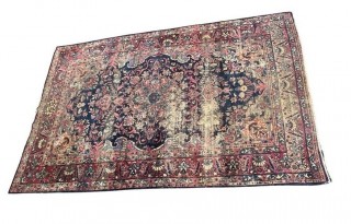 Hand Knotted Persian Rug with Repeating Pattern on Blue and Red Ground. Wear throughout. 56 x 87" 