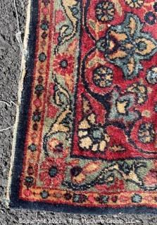 Hand Knotted Persian Rug with Repeating Pattern on Blue and Red Ground. Wear throughout. 56 x 87" 