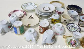 Assortment including collectible porcelain tea cups and saucers 