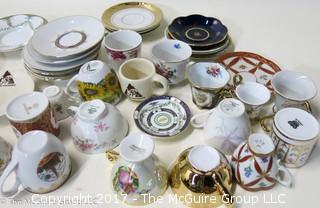 Assortment including collectible porcelain tea cups and saucers 