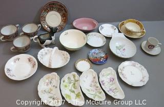 Eclectic collection of porcelain and ceramic serving ware including Limoges, Wedgwood and Spode  