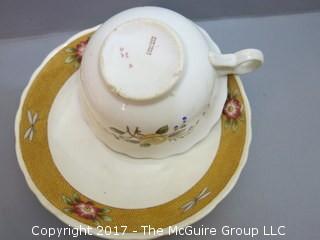 Eclectic collection of porcelain and ceramic serving ware including Limoges, Wedgwood and Spode  