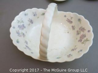 Eclectic collection of porcelain and ceramic serving ware including Limoges, Wedgwood and Spode  