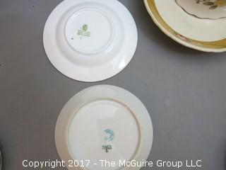 Eclectic collection of porcelain and ceramic serving ware including Limoges, Wedgwood and Spode  