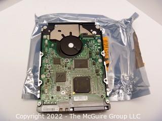 One (1) 300GB HP 3.5 hard drive in open packaged but looks new/unused?