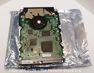 One (1) 300GB HP 3.5 hard drive in open packaged but looks new/unused?