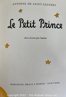 Group of Vintage Hard Cover Books Including the Petit Prince, Metropolitan Museum of Art, Cartoons of France, etc.