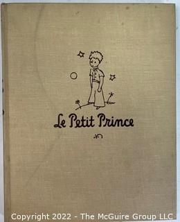 Group of Vintage Hard Cover Books Including the Petit Prince, Metropolitan Museum of Art, Cartoons of France, etc.