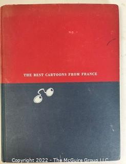 Group of Vintage Hard Cover Books Including the Petit Prince, Metropolitan Museum of Art, Cartoons of France, etc.