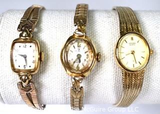 Three (3) Women's Gold Toned Watches was 0043RO