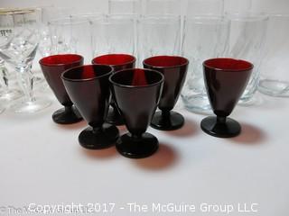 Assorted sets of glassware including cranberry and Irish Coffee stems 