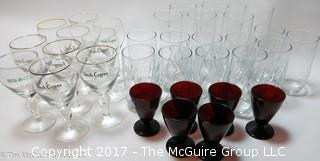 Assorted sets of glassware including cranberry and Irish Coffee stems 