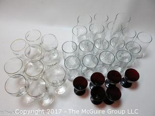 Assorted sets of glassware including cranberry and Irish Coffee stems 