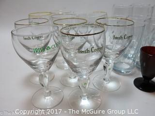 Assorted sets of glassware including cranberry and Irish Coffee stems 