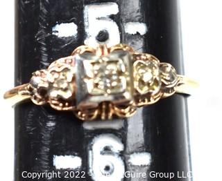 Art Deco Diamond Engagement Ring with Three Diamonds Mounted In A 14k White And Yellow Gold Band. 1.2 grams total weight