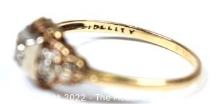 Art Deco Diamond Engagement Ring with Three Diamonds Mounted In A 14k White And Yellow Gold Band. 1.2 grams total weight