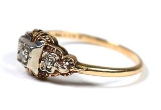 Art Deco Diamond Engagement Ring with Three Diamonds Mounted In A 14k White And Yellow Gold Band. 1.2 grams total weight