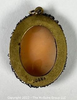 19th Century Hand Carved Cameo Set in Gold Filled Bezel Marked BA800. Measures 1" long.