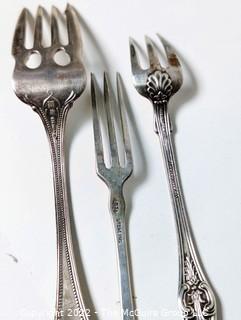 Eighteen (18) Sterling Silver Flatware Forks Including Salad, Pickle and Garnish.  All with Hallmarks.  Weighs 476 grams. 