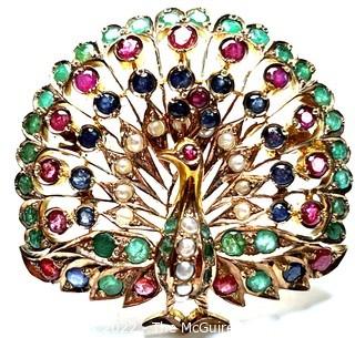 14kt Yellow Gold Peacock Brooch Pendant with Rubies, Emeralds, Sapphires and Pearls. It is unmarked, but tests as 14kt.