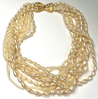 Carolee Signed Faux Fresh Water Pearl Multi Strand with Gold Bow Clasp Necklace. 