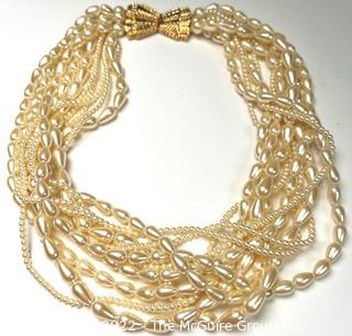 Carolee Signed Faux Fresh Water Pearl Multi Strand with Gold Bow Clasp Necklace. 