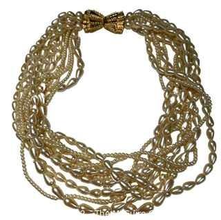 Carolee Signed Faux Fresh Water Pearl Multi Strand with Gold Bow Clasp Necklace. 