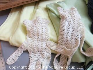 Collection including baskets (note damage to handles), linens, vintage Revlon buffer, Empirin compound bottle and ladies dress gloves