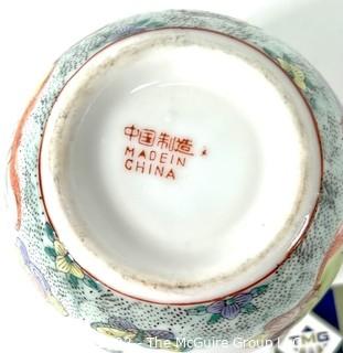 Chinese Hand Painted on White Ground Round Porcelain Vase. Measures 4" tall.