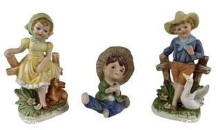 Three (3) Porcelain Figurines of Children