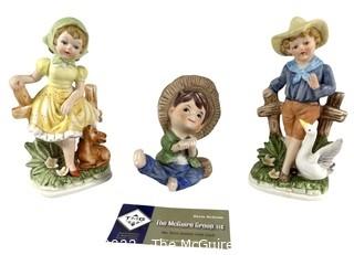 Three (3) Porcelain Figurines of Children