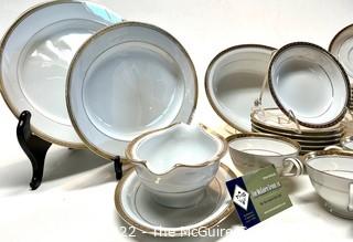 Set of Noritake Porcelain China Dinnerware in Richmond Pattern and Gold Edge.