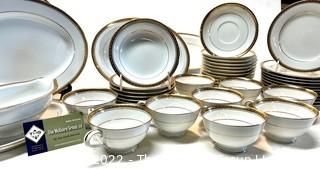 Set of Noritake Porcelain China Dinnerware in Richmond Pattern and Gold Edge.