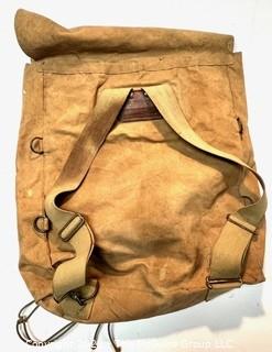 Vintage Canvas Boy Scout Haversack Backpack with BSA Emblem Stamped on Flap Closure. 