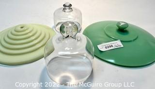 Two (2) Clear Glass Cloches, Jadeite Glass Casserole Pot Top and Jadeite Glass Lamp Base.