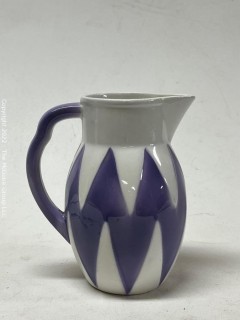 Enamel Glaze Pottery Pitcher with Purple Diamond Pattern, Made in Germany, Signature On Base.  7" tall. 