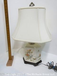 Ceramic table lamp with Asian motif; includes shade 